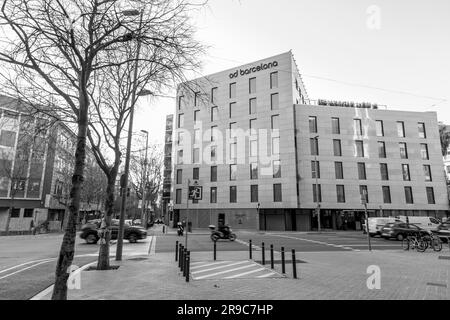 Barcelona, Spain - February 10, 2022: Buildings around the Passeig de Gracia, one of the main avenues in Eixample district of Barcelona, Spain. Stock Photo