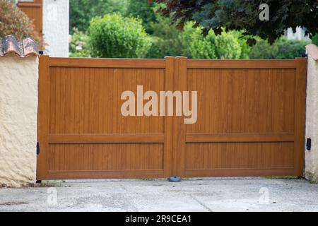 door wooden gate facade in street view outdoor home portal steel entrance Stock Photo