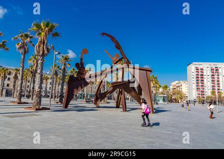 Barcelona, Spain - FEB 10, 2022: Modern sculpture by Alfredo Lanz from 2004, titled Tribute to the Swimming, Homenaje a la Natacio at Barceloneta Beac Stock Photo