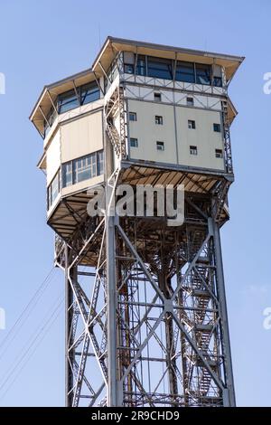 Barcelona, Spain - FEB 10, 2022: Torre Sant Sebastia is a 78 metre tall free standing lattice tower in Barcelona, Catalonia, Spain which is used as a Stock Photo