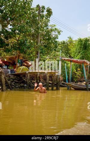 Damnoen Saduak - Thailand May 23, 2023. On the canals of Damnoen Saduak Floating Market by boat. Stock Photo