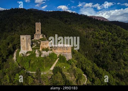 Aerial view of the Cantelmo castle in Popoli surrounded by the pine forest on Mount Morrone. Popoli, Pescara province, Abruzzo, Italy, Europe Stock Photo