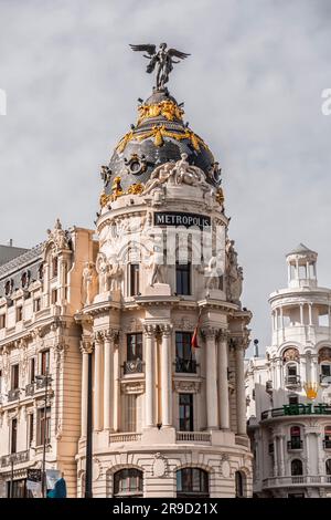 Madrid, Spain - FEB 17, 2022: The Metropolis Building is an office building in Madrid, at the corner of the Calle de Alcala and Gran Via. Opened in 19 Stock Photo