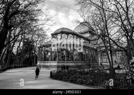 Madrid, Spain - FEB 16, 2022: El Palacio de Cristal, The Glass Palace is a conservatory located in Madrid's Buen Retiro Park. Originally designed as a Stock Photo