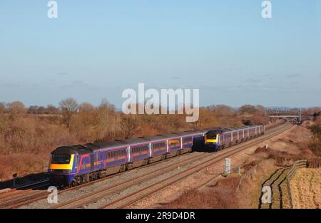 Two First Great Western HST’s passing each other on the Great Western Mainline at Denchworth. 9th February 2006. Stock Photo