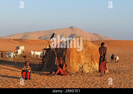 Himba Village near Serra Cafema Wilderness Safaris at Kunene Riv, Kunene Region, Namibia Stock Photo