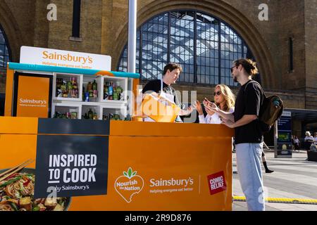 EDITORIAL USE ONLY (Left to right) Jack Ashton, Alice Donnelly and Charlie Goldsmith at the Sainsbury's 'DINspiration' pop-up at London's Kings Cross station has been launched to support its community programme, Nourish the Nation, with Comic Relief. Picture date: Monday 26, 2023. Stock Photo