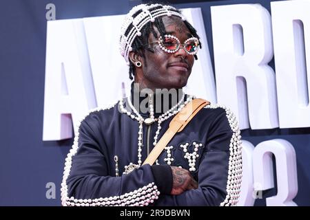 Lil Uzi Vert Drips in Pearls With Leather Boots at BET Awards 2023 –  Footwear News