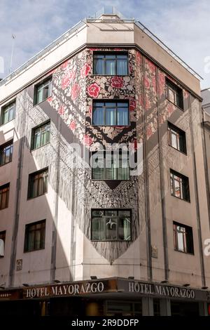 Madrid, Spain - FEB 16, 2022: Generic architecture and street view in the central streets of Madrid, the capital of Spain. Hotel Mayorazgo at Gran Via Stock Photo