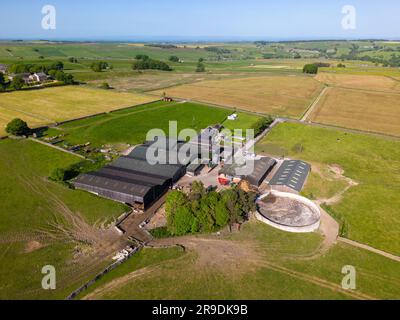 Aerial drone view of the countryside in North-Yorkshire England. There is a lot of farmland in the Yorkshire Dales. Stock Photo