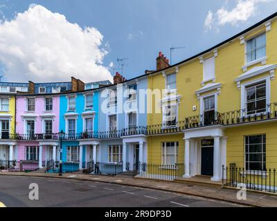 brightly-coloured houses in London Primrose hill. You can see these in many movies and TV series. Stock Photo
