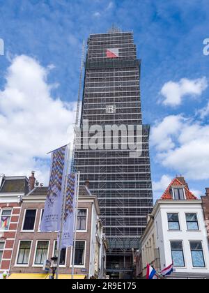 The Dom Tower in the Dutch city of Utrecht covered in scaffolding undergoing restoration, Netherlands, Europe. Stock Photo
