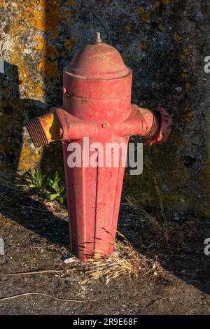 Red painted fire hydrant, Kefalonia,Greece Stock Photo