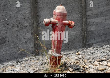 Red painted fire hydrant, Kefalonia,Greece Stock Photo