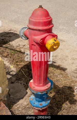 Red painted fire hydrant, Kefalonia,Greece Stock Photo
