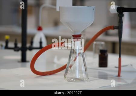 Porcelain buchner funnel that filters under vacuum. Stock Photo