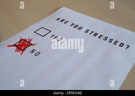 Stressed guy concept: say you are not stressed but lie Stock Photo