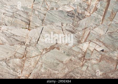 rock background or stone abstract texture. Stones texture and background. Rock texture, selective focus, copy space. side view of rock cut in nature, Stock Photo