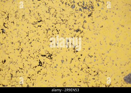 Vintage grunge texture with a touch of retro charm. Aged paper backdrop in yellow and brown, perfect for artistic designs. Stock Photo