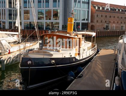 Modern yacht old boat replica named Gentleman at the Gdansk Marina in Nowa Motlawa River, Old Town of Gdansk, Poland Stock Photo