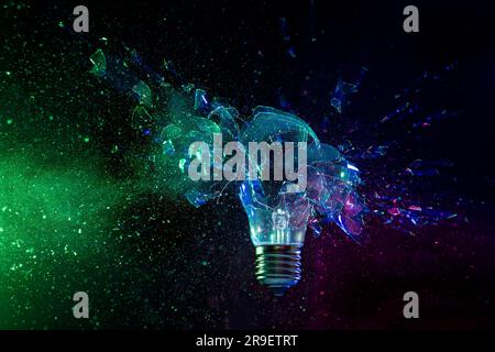 blue violet and green shattering bulb on black background Stock Photo