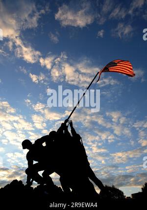 The United States Marine Corps War Memorial (Iwo Jima Memorial) at sunset. Arlington, USA. Stock Photo