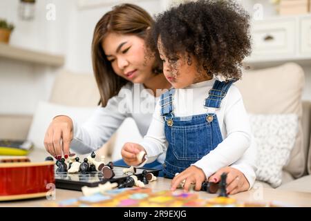 Happy family spending time together at home Stock Photo