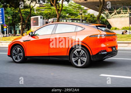 An XPeng G6 Performance electric SUV car being driven on a test drive in Guangzhou, Guangdong Province, China. Stock Photo