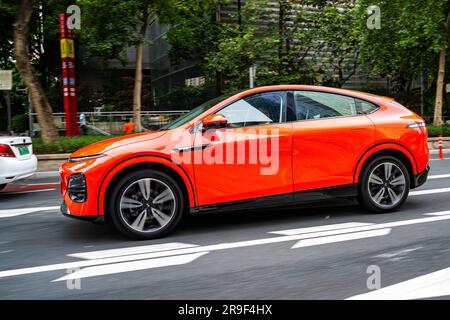 An XPeng G6 Performance electric SUV car being driven on a test drive in Guangzhou, Guangdong Province, China. Stock Photo