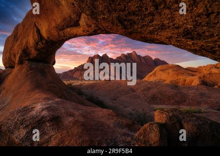 Dramatic sunset over Spitzkoppe Mountain in Namibia, Africa. Stock Photo