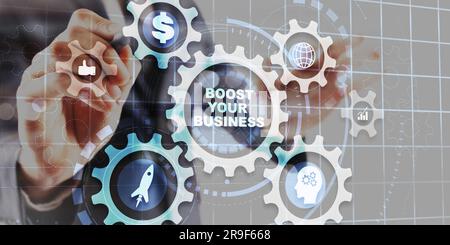 Boost your business on Virtual screen Gears. Business Technology Internet and network concept. Stock Photo