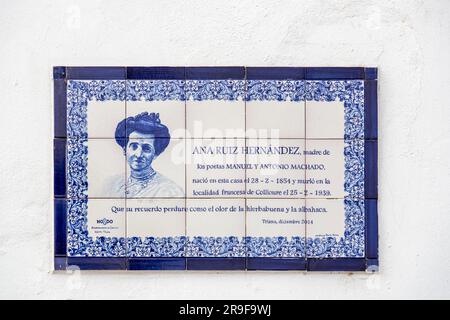 Seville, Spain-FEB 24, 2022: Ceramic tile signboard of the birth house of Ana Ruiz Hernandez, the mother of the Spanish poets Manuel and Antonio Macha Stock Photo