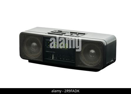 Old stereo alarm clock radio isolated with cut out background. Stock Photo