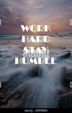 Sunset background with life inspirational quotes - Work hard stay humble Stock Photo