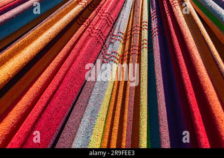 A close-up image of the colorful cloth of a hammock Stock Photo
