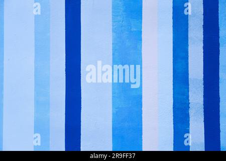 Grunge concrete wall with colorful stripes, stains and cracks Stock Photo