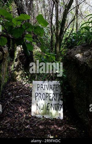 No Entry sign at Labyrinth Rocks, a series of Limestone Canyons, near Takaka, Golden Bay, Tasman, South Island, New Zealand. Photo: Rob Watkins Stock Photo