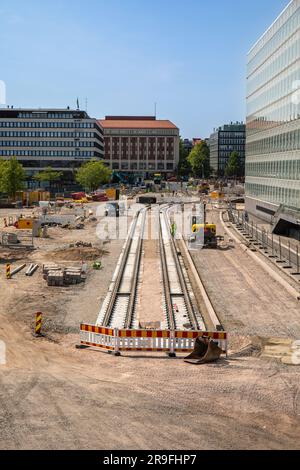 New tramway or light rail tracks under construction at Hakaniemenranta in Hakaniemi district of Helsinki, Finland Stock Photo