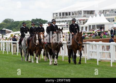 Ascot, Berkshire, UK. 24th June, 2023. Thames Valley Police Mounted Section police officers and horses on duty on the racetrack at Ascot Racecourse during Royal Ascot week. Credit: Maureen McLean/Alamy Stock Photo