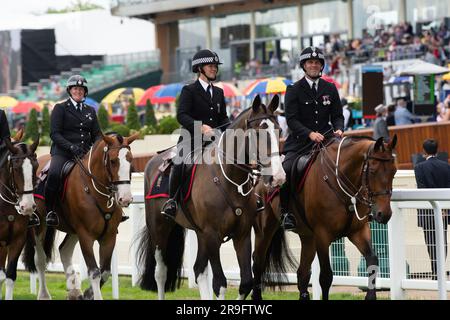 Ascot, Berkshire, UK. 24th June, 2023. Thames Valley Police Mounted Section police officers and horses on duty on the racetrack at Ascot Racecourse during Royal Ascot week. Credit: Maureen McLean/Alamy Stock Photo