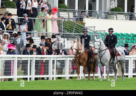 Ascot, Berkshire, UK. 24th June, 2023. Thames Valley Police Mounted Section police officers and horses on duty on the racetrack at Ascot Racecourse during Royal Ascot week. Credit: Maureen McLean/Alamy Stock Photo