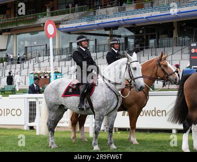 Ascot, Berkshire, UK. 24th June, 2023. Thames Valley Police Mounted Section police officers and horses on duty on the racetrack at Ascot Racecourse during Royal Ascot week. Credit: Maureen McLean/Alamy Stock Photo