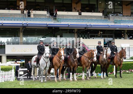 Ascot, Berkshire, UK. 24th June, 2023. Thames Valley Police Mounted Section police officers and horses on duty on the racetrack at Ascot Racecourse during Royal Ascot week. Credit: Maureen McLean/Alamy Stock Photo