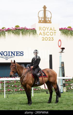 Ascot, Berkshire, UK. 24th June, 2023. Thames Valley Police Mounted Section police officers and horses on duty on the racetrack at Ascot Racecourse during Royal Ascot week. Credit: Maureen McLean/Alamy Stock Photo