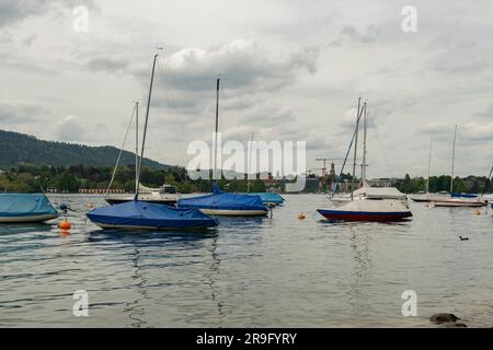 Zurich, Switzerland, May 9, 2023 Little boats at the coast of the lake of Zurich Stock Photo