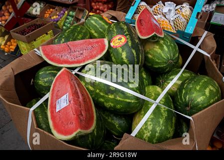 Watermelons on sale outside a convenience store on Nicolson Street, Edinburgh, Scotland, UK. Stock Photo