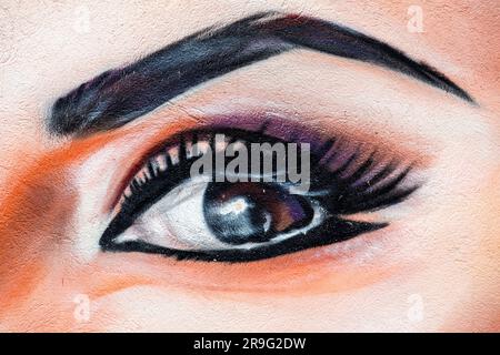 Detail from a mural, vibrant female eye, spray paint art Stock Photo