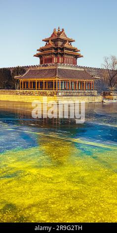 The majestic Watchtower and moat at The Forbidden City near the pond Stock Photo