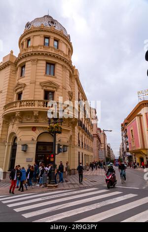 Granada, Spain - February 26, 2022: Generic architecture and street view around the main street of Reyes Catolicos in Granada, Spain. Stock Photo