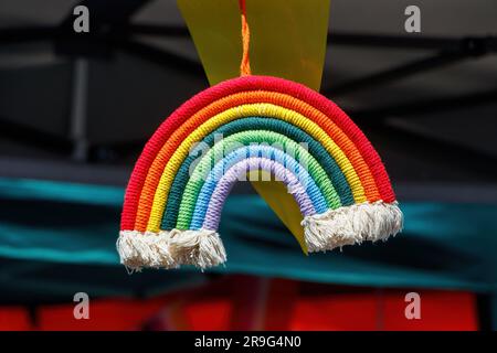 fabric woven pride rainbow hanging ornament at Stoke on Trent gay pride parade event in hanley park staffordshire June 2023 Stock Photo
